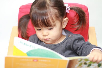 A two year old girl that can read on her own